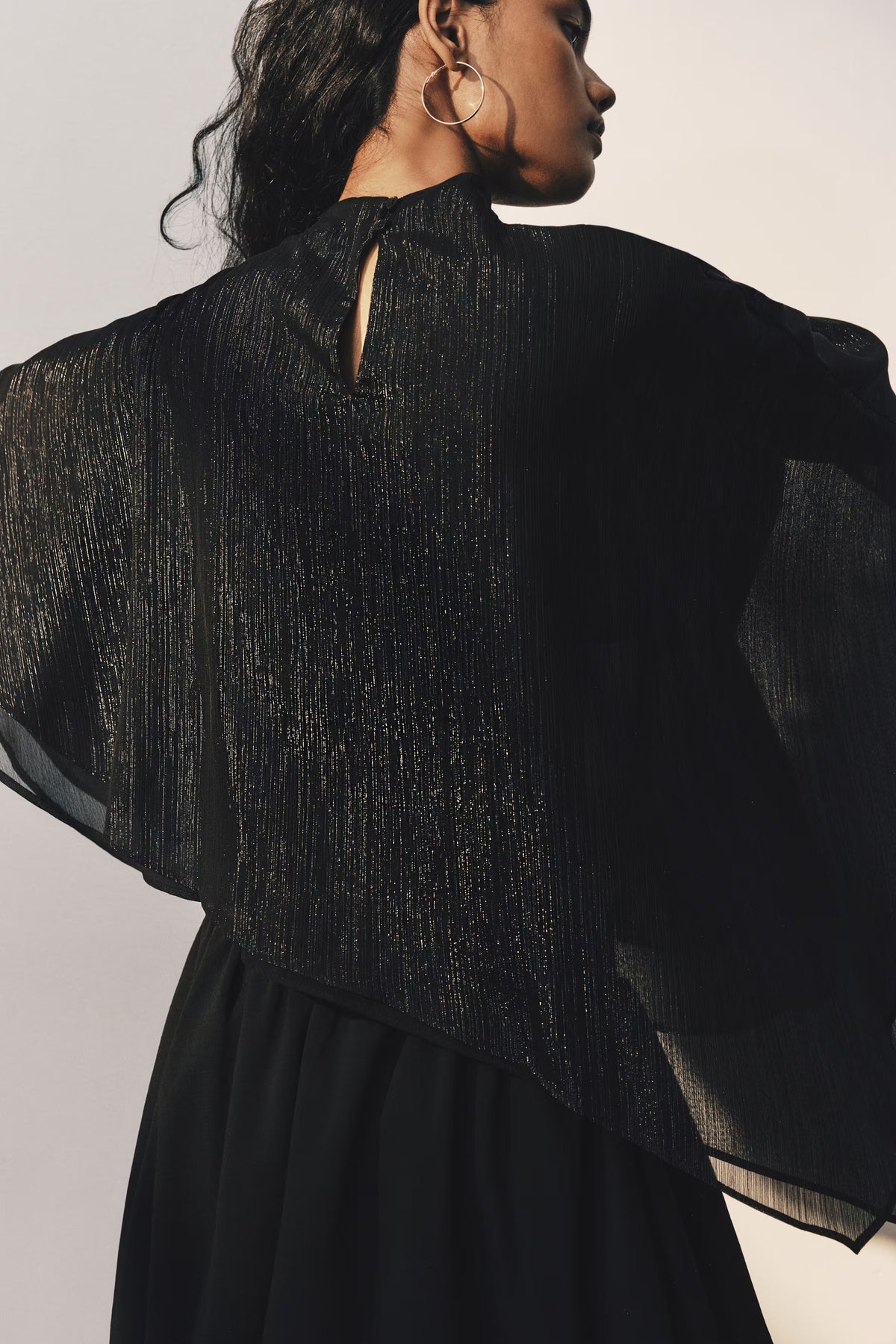 Asymmetric turtleneck cape